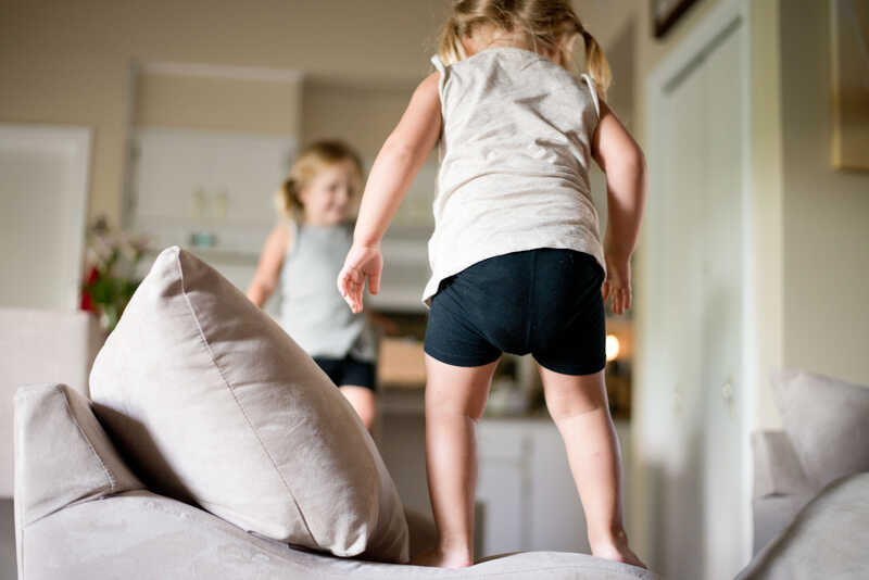 kids jumping on couch